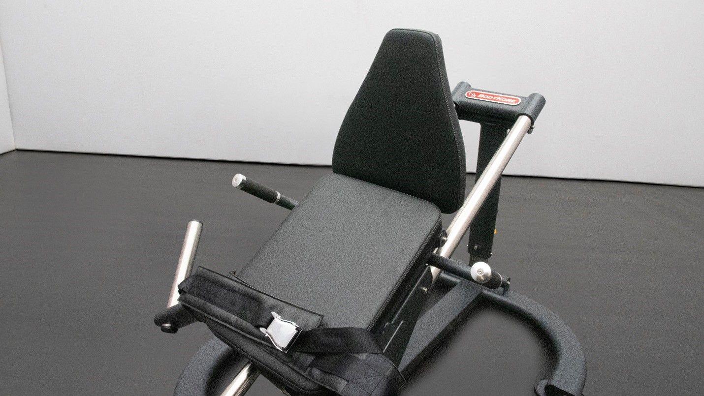 Backrest lies down and seat pad hinges up for hip thrust exercise