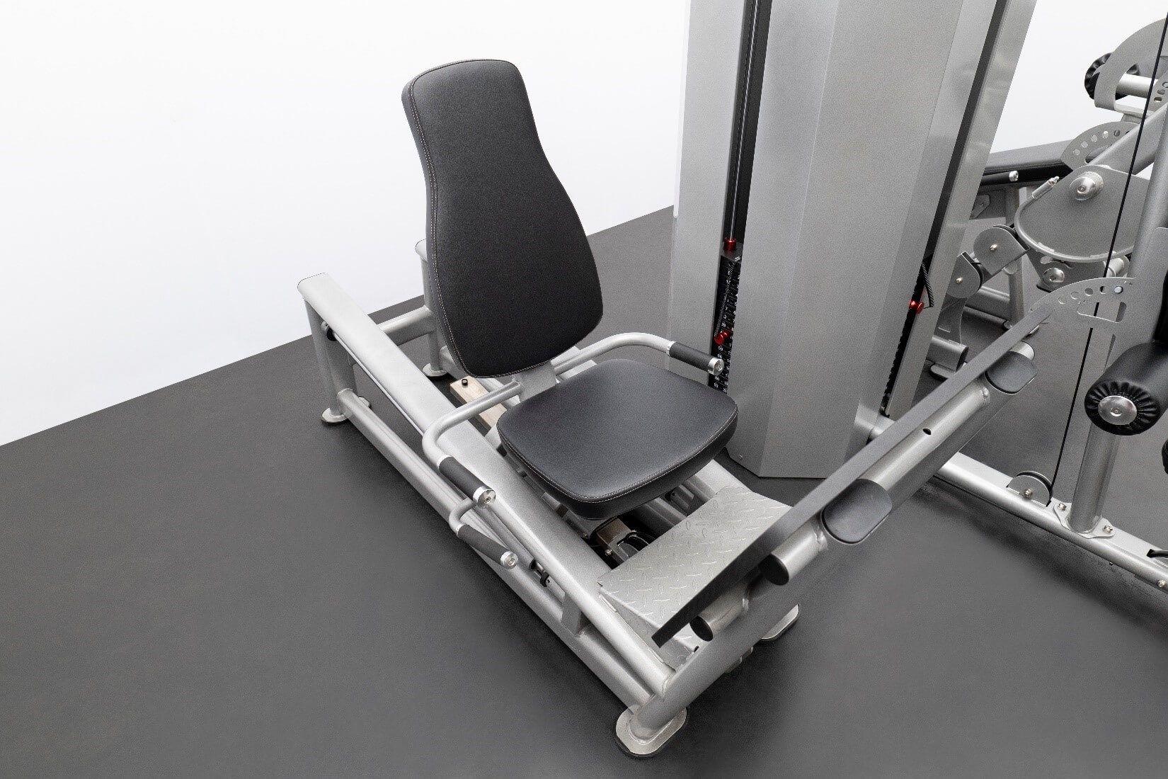 Seated leg press is on linear bearings for safety and comfortability